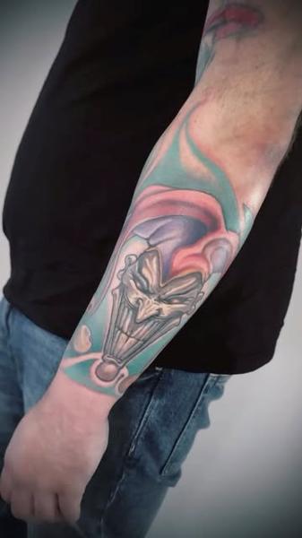 Illustrative menacing jester tattoo by @delavina.ttt