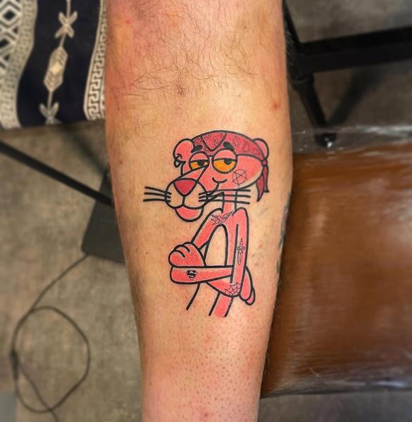 Cartoon pink panther tattoo by @shuhari_tattoo