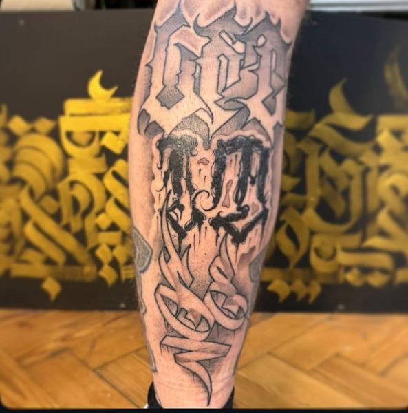 Lettering gothic lettering tattoo by @shuhari_tattoo