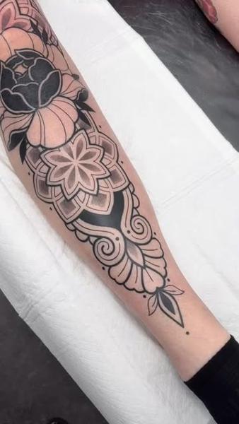 Blackwork ornamental floral tattoo by @staceytattoos