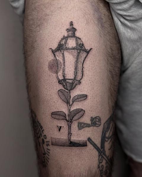Fine line lamp rose tattoo by @_avlamis