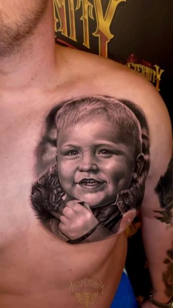 Realism child portrait tattoo by @stefan_artofeternity