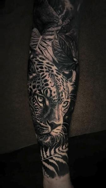 Realism leopard portrait tattoo by @stefan_artofeternity