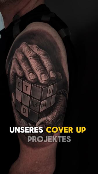 Realism hand with cube tattoo by @stefan_artofeternity