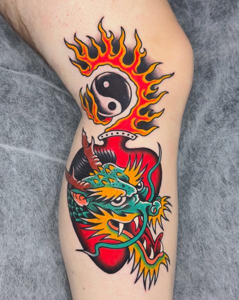 Traditional dragon and yin yang tattoo by @stef_mits_tattoo