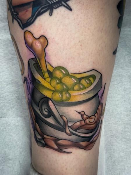 Neo-traditional cauldron potion tattoo by @stelios.linas
