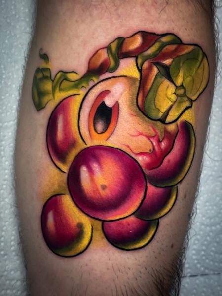 New school eyeball grapes tattoo by @stelios.linas