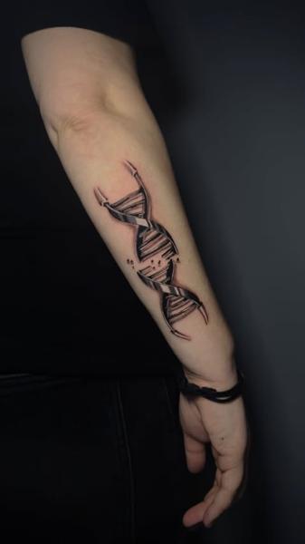 Realism dna helix tattoo by @delina_st_tattoo