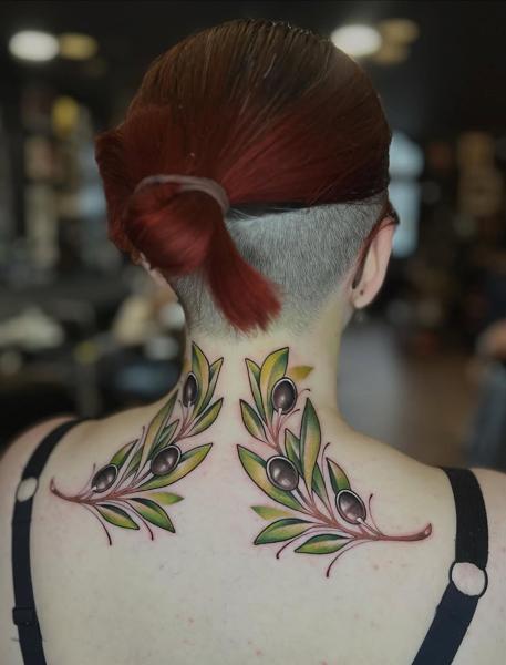 Illustrative olive branches tattoo by @stephanie_melbourne