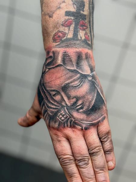 Realism religious figure tattoo by @tattoozbysteve