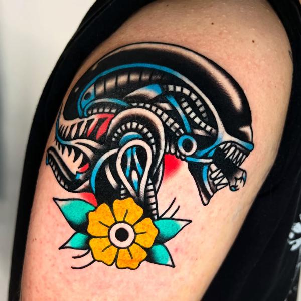Traditional alien head tattoo by @stoyjunx