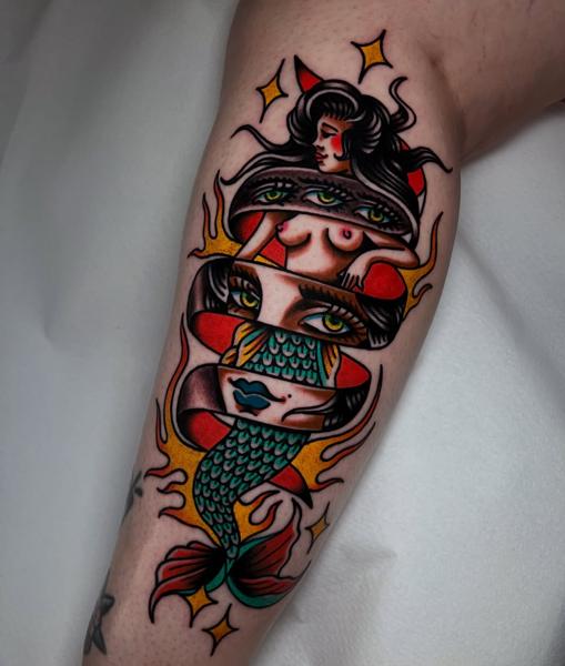 Traditional mermaid woman tattoo by @stoyjunx