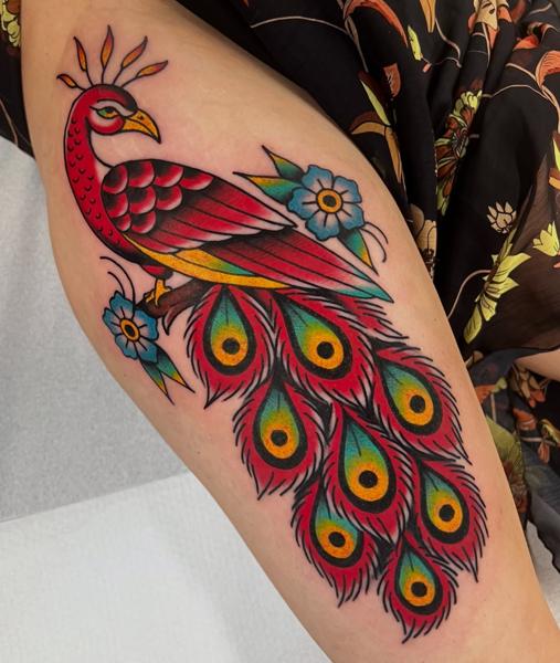 Traditional peacock tattoo by @stoyjunx