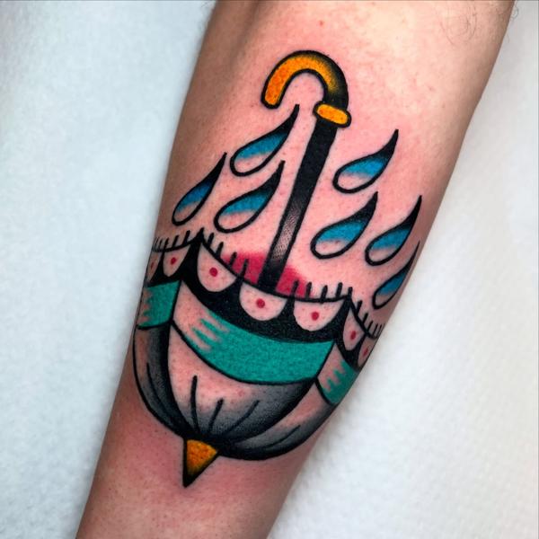 Traditional umbrella tattoo by @stoyjunx