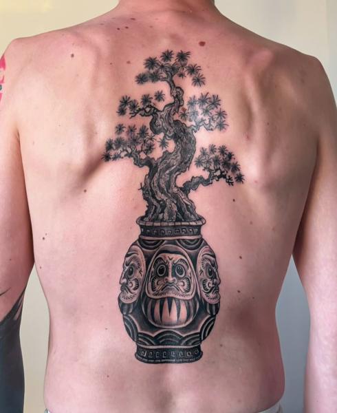 Blackwork bonsai in vase tattoo by @suzetattoos