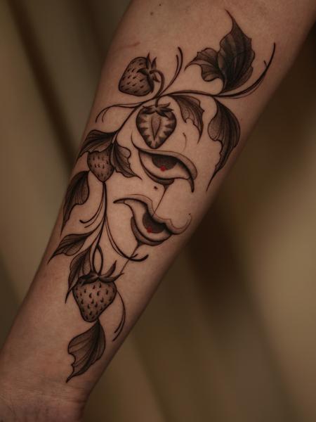 Illustrative strawberry face tattoo by @sylvia__ink
