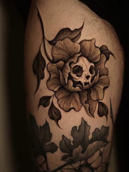 Blackwork skull flower tattoo by @sylvia__ink