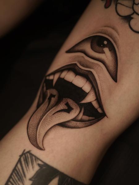 Realism eye mouth tattoo by @sylvia__ink