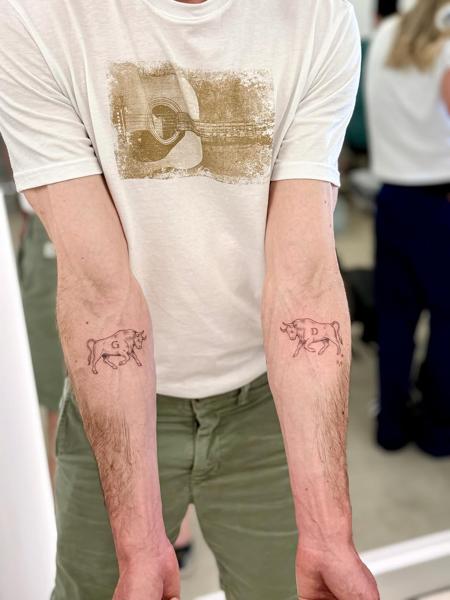 Fine line running bulls tattoo by @talbooker