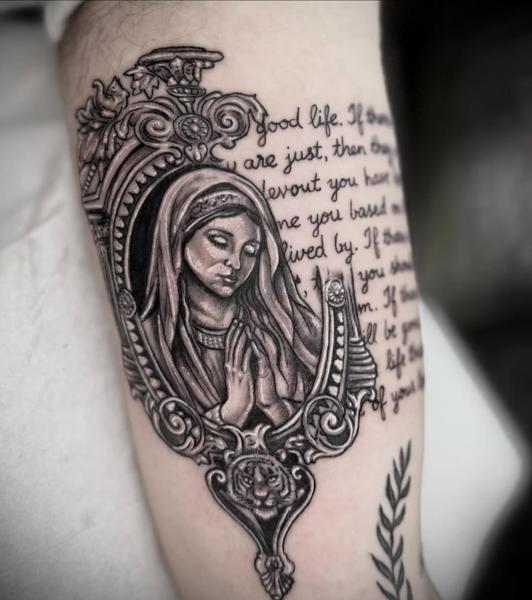 Illustrative virgin mary portrait tattoo by @tattooinestudios