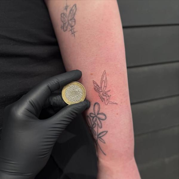 Fine line fairy tattoo by @tattoosbycay