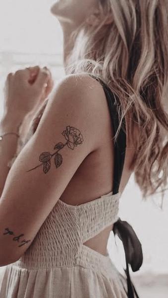 Fine line single rose tattoo by @terrie_titouutattoo