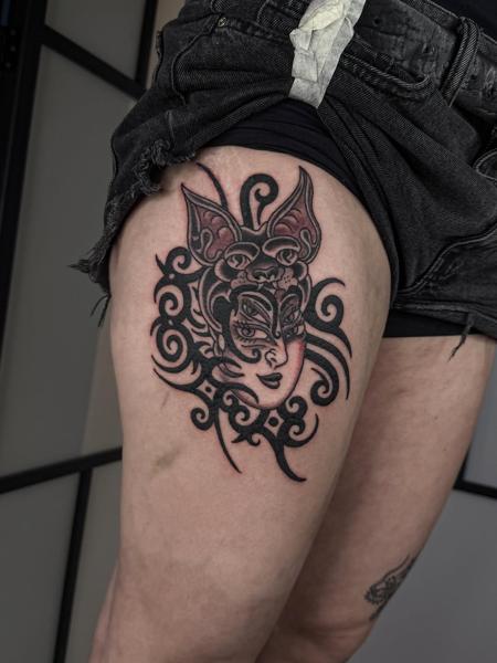 Ornamental ornamental mask tattoo by @wastedyouth.tattooer