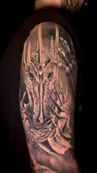 Realism armored figure tattoo by @thanos_stokas_tattoo