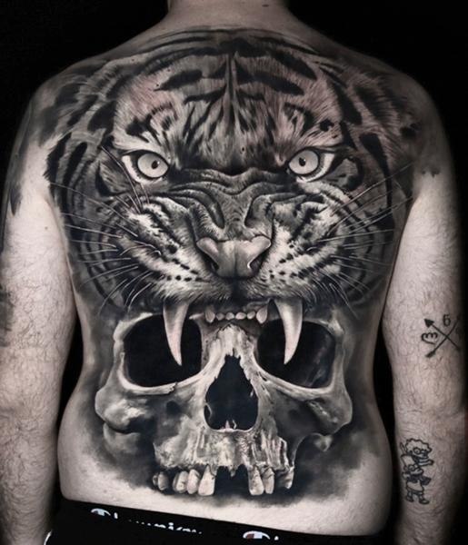 Realism tiger skull tattoo by @thanos_stokas_tattoo