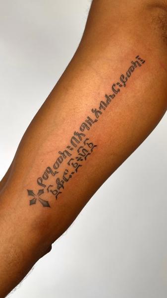 Blackwork script and cross tattoo by @the27life