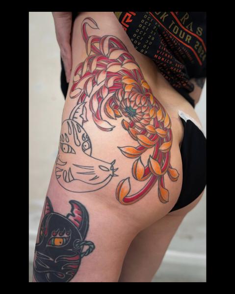 Traditional floral snake tattoo by @the27life