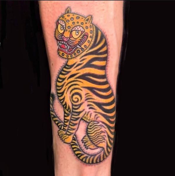 Traditional tiger tattoo by @the_dan_gold