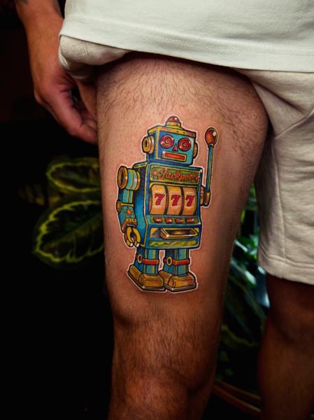 Traditional robot slot machine tattoo by @the_dan_gold