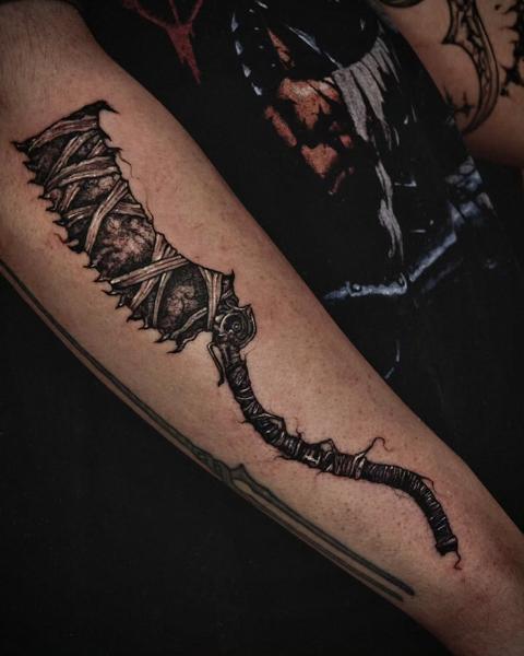 Illustrative wrapped blade tattoo by @inkeepertattooathens