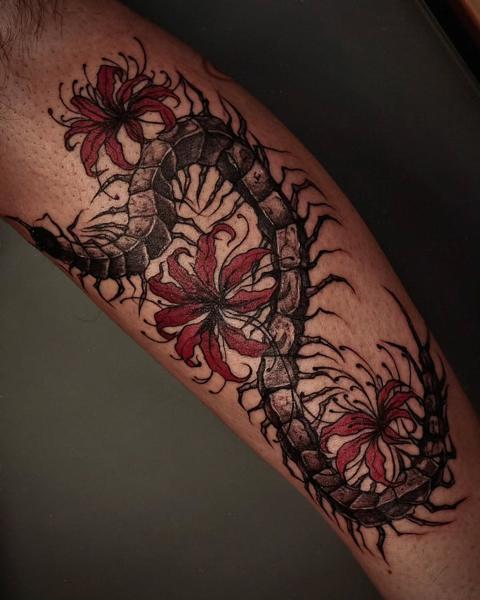 Illustrative centipede and flowers tattoo by @inkeepertattooathens