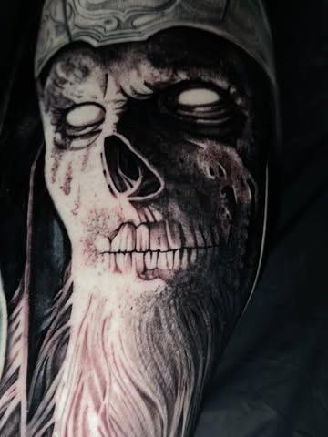 Realism skull portrait tattoo by @tomftattoo