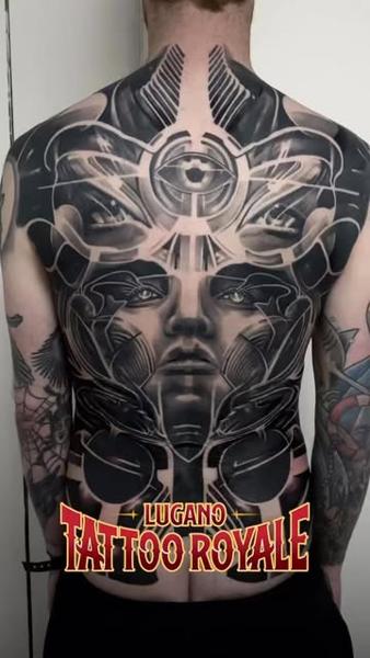 Blackwork abstract face tattoo by @tomftattoo