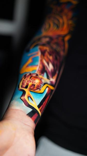 Realism phoenix tattoo by @torrestattoo38