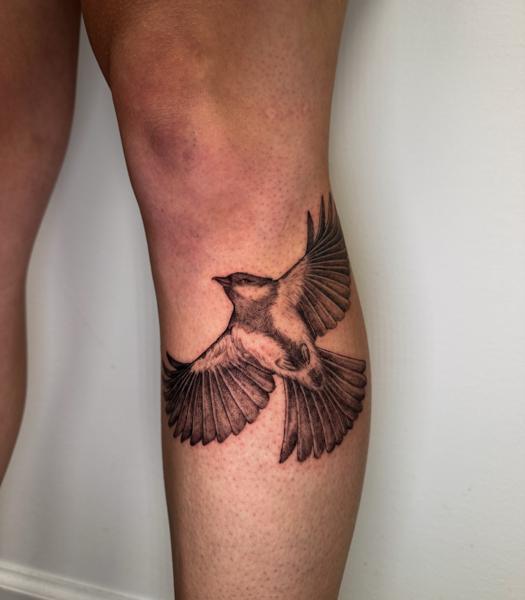 Realism flying bird tattoo by @total_eclipse_tattoo