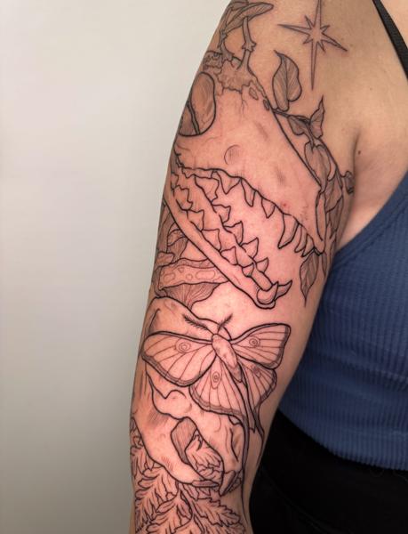 Linework skull and moth tattoo by @total_eclipse_tattoo