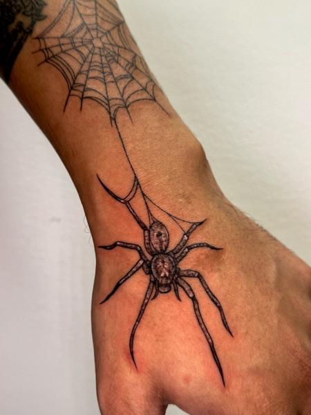 Linework spider web tattoo by @total_eclipse_tattoo