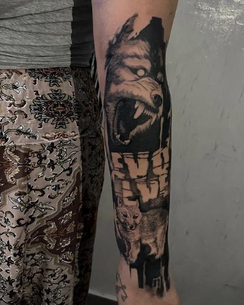 Realism wolf portrait tattoo by @zachosink