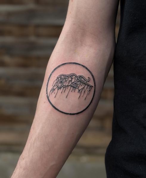 Fine line mountain landscape tattoo by @zachosink