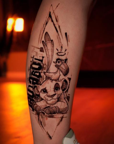 Illustrative cartoon lion tattoo by @zachosink