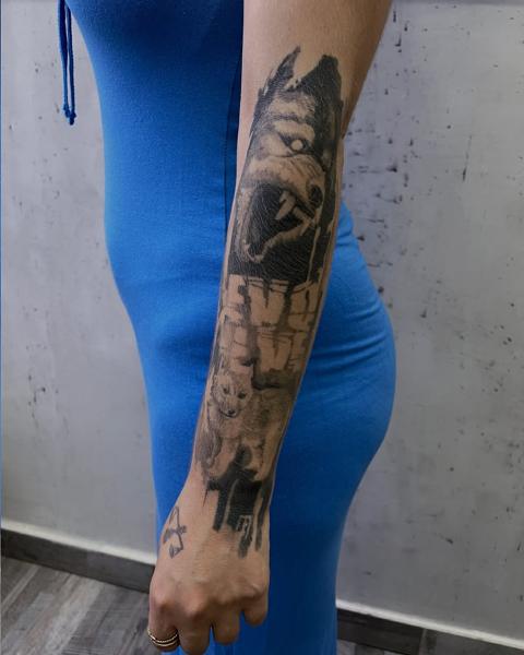 Realism wolf portrait tattoo by @zachosink