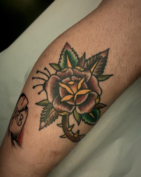 Traditional traditional rose tattoo by @usual_suspect_ttt