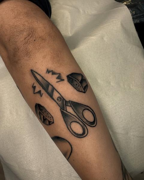 Traditional scissors and rocks tattoo by @usual_suspect_ttt