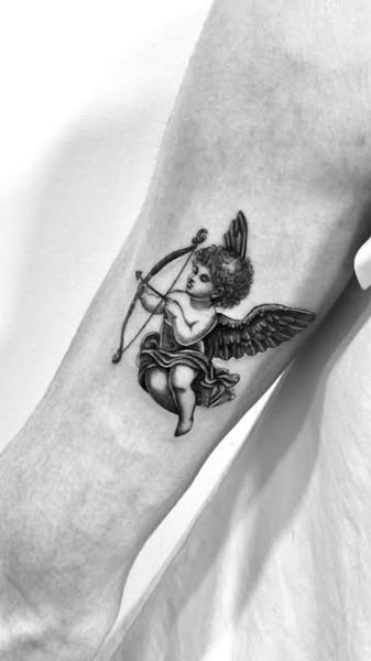 Realism cherub archer tattoo by @vanillaflows
