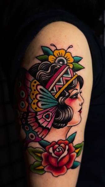 Traditional butterfly woman tattoo by @vasso_lowbrow