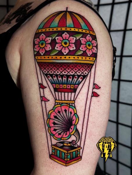 Traditional hot air balloon tattoo by @vasso_lowbrow
